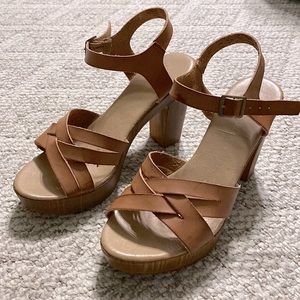 Altar’d state light brown platform heels.